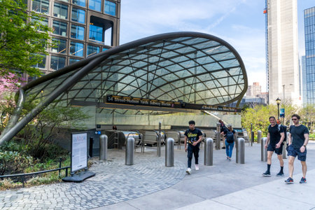 New York, NY - USA - April 14, 2023 View of the turtle shell-shaped glass canopy Entrance to the 34 Street-Hudson Yards Subway Station, the western terminus for the 7 Line.のeditorial素材