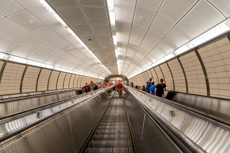 New York, NY - USA - April 14, 2023 View of the escalators to the entrance to the 34 Street-Hudson Yards Subway Station, the western terminus for the 7 Line.のeditorial素材