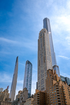 New York, NY - USA - April 14, 2023 Vertical view from Central Park South of the  super tall skyscrapers, Central Park Tower, the Steinway Tower, and One57, in Midtown Manhattan.のeditorial素材