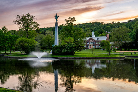 Montclair, NJ - USA - May 13, 2023  Sunset view of Soldiers and Sailors Memorial in Edgemont Park featuring the tall granite obelisk Winged Victory. Designed by sculptor Charles Keck in 1925.のeditorial素材