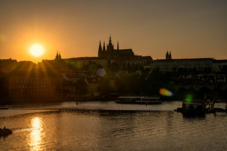 Prague, Bohemia â CZ â June 4, 2023 A sunset view MalÃ¡ Strana, also known as the Lesser Town on the other side of the Vltava River from the Old Town with the Prague Castle in the distance.のeditorial素材