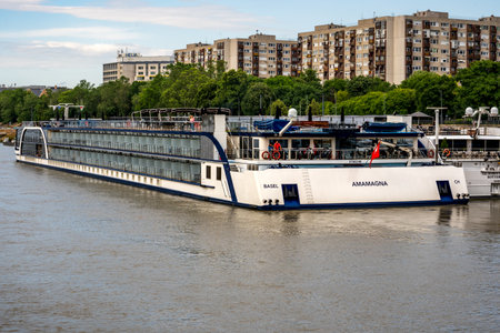 Budapest, HU â June 11, 2023  AmaMagna moored along the Danube River. A new river cruise ship with a double width design, specifically designed for Europe's top-luxury river travel marketのeditorial素材