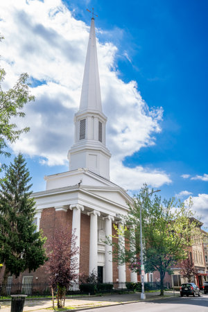 Troy, NY - US - Aug 13, 2023 Vertical view of the former First Baptist Church of Troy and Troy Prep School built in 1795. Now the Fraternity of Phi Gamma Delta.のeditorial素材
