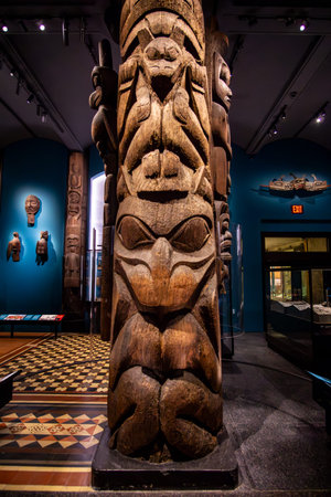New York, NY â€“ US â€“ Oct 9, 2023 Vertical interior view of a totem pole at the American...