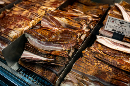 Philadelphia, PA â US â Oct 14, 2023 Display case filled various cuts of bacon in the historic Reading Terminal Market, an enclosed public market located in Center City section of Philadelphia.のeditorial素材