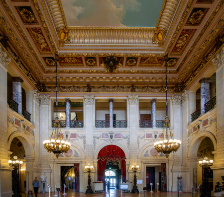 Newport, RI - US - Sept. 18, 2020: Horizontal interior view of the opulent Great Hall of the historic Breakers; the Gilded Age summer home of Cornelius Vanderbilt.のeditorial素材