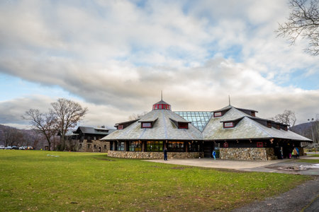Bear Mountain, NY - US - Dec 30, 2023 Landscape exterior view the pavilion housing the Merry-Go-Round at Bear Mountain State Park. The Carousel features scenes of the park and hand carved seats.のeditorial素材