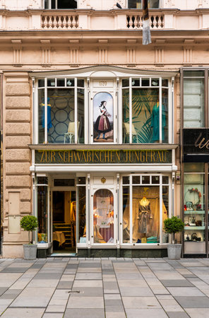 Vienna, AT - June 9, 2023 Zur SchwÃ¤bischen Jungfrau, a prestigious shop in the heart of Vienna. Founded in 1720, the manufacturer known for producing the high quality table and bed linen.のeditorial素材