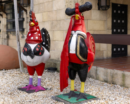 Miami FL - US - Feb 10, 2024 Two Giant rooster statues, the fiberglass statues can be found all over Little Havanaâs Calle Ocho and is part of the âRooster Walkâ a popular symbol for the community.のeditorial素材