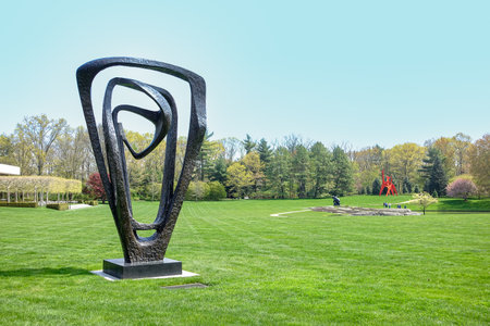 Purchase, NY â US â Apr 28, 2024 Barbara Hepworthâs Meridian, a triangular sculpture of bronze loops on the Donald M Kendall Sculpture Gardens at the PepsiCo World headquarters in Purchase.のeditorial素材