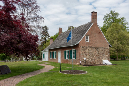 Tappan, NY â€“ US â€“ May 6, 2024 Three quarter view of the historic DeWint House, a stone...