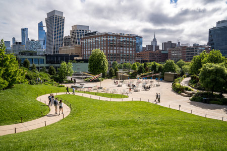 New York, NY â US â May 19, 2024 Wide angle view of the Main Lawn and Playground of New York Cityâs unique Little Island, a riverfront park overlooking the Hudson River.のeditorial素材