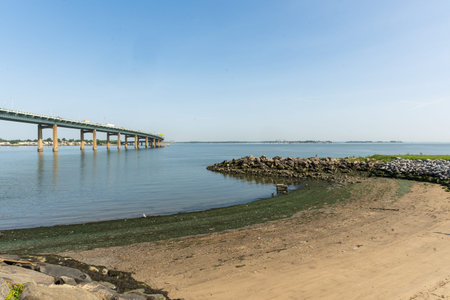 Bronx, NY - US - Aug 24, 2024 The Throgs Neck Bridge is a majestic span crossing the East River and...