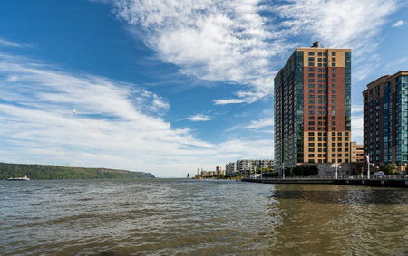 Yonkers, NY - US - Sep 21, 2024 The Yonkers riverfront features modern condos and lush parks, offering scenic views of the Hudson River, blending urban living with serene green spaces for all to enjoyのeditorial素材