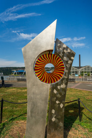Yonkers, NY - US - Sep 21, 2024 Dale Rogersâ "Fire Dance" sculpture at Yonkers Riverfront features metallic shapes with a vibrant, hypnotic center, blending abstract design with natural surroundingsのeditorial素材