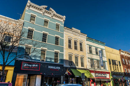 Nyack, NY - US - Jan 24, 2026 Colorful historic buildings line Main Street in downtown Nyack, NY, on a sunny day. Eclectic shops and galleries create a charming, artistic village scene.のeditorial素材