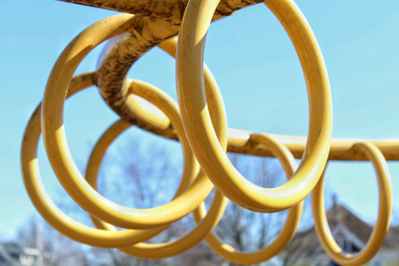 Monkey Bar Rings in a loop At The Park for climbing On A Sunny Dayの写真素材