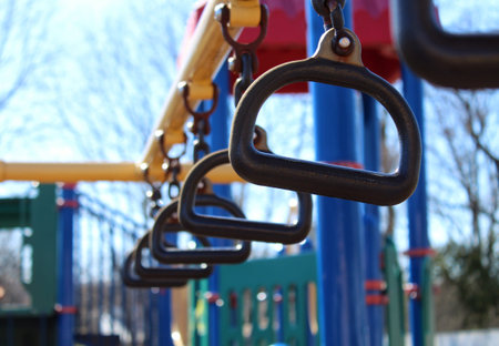 Straight Monkey Rings for climbing and swinging At The Park on a sunny day