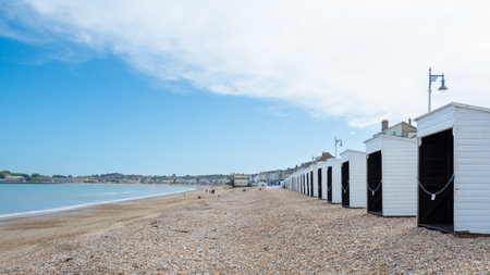 Beach huts on Weymouth beach a popular tourist town in Dorset England United Kingdomの写真素材