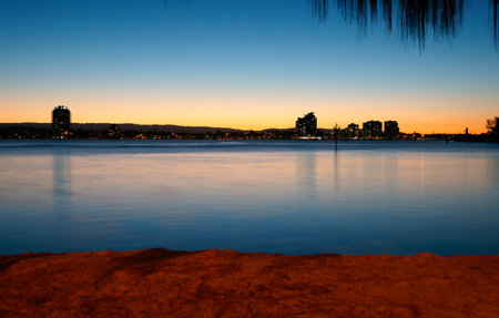 Evening light effect, sky, river and beach rich colour glow.の写真素材
