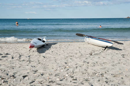 TAURANGA, NEW ZEALAND, January 23, 2012; Surf skis lie on scenic beach at Maunganui.のeditorial素材