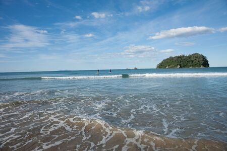 Tauranga, New Zealand, January 23, 2012, Paddleboarders enjoy scenic beach at Mount Maunganui. のeditorial素材