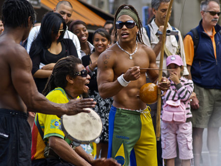Paris, France - February 22, 2009; entertainment being provided by street performers in Paris.