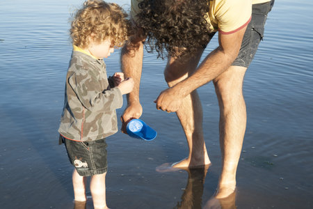 Father and son at beach 