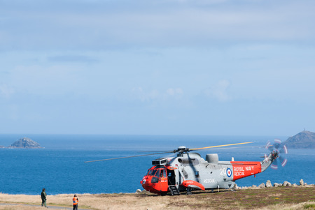 Lands End, England - July 25, 2013  Helicopter lands to demonstrate search and rescue as part of training のeditorial素材