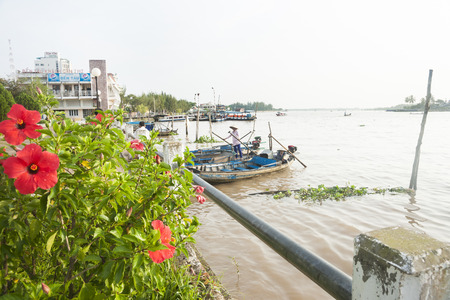 Can Tho, Vietnam - October 16, 2013  The Mekong Delta at Cantho, traditional river boats alonside the river edge  Can Tho is located on the south bank of the H  7853;u River, the bigger branch of the Mekong River のeditorial素材