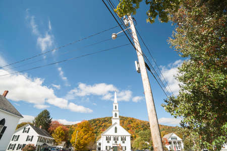 Small town America wide angle street scene in Newfane, Vermont, USA with white buildings and characteristic black shutters.の写真素材