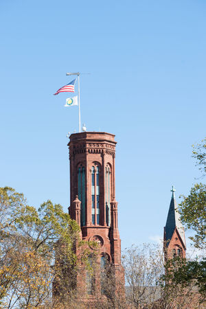 Brick tower with US flag.のeditorial素材