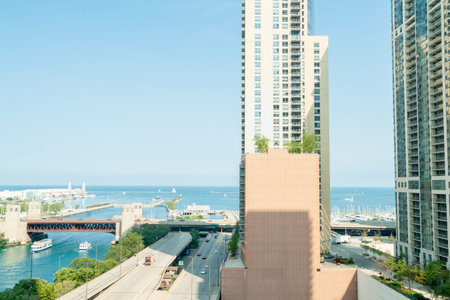 CHICAGO, USA - AUGUST 28, 2014; Lake Michigan aerial view through high-rise apartment buildings from...