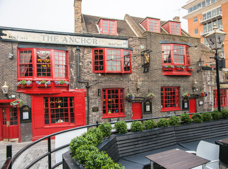 London, England - July 16, 2013; Historic pub The Anchor dates back to 1615 is a landmark property on Bankside Southwark London UK.のeditorial素材