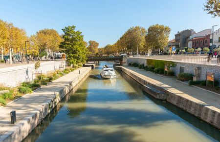 Urban streets, scenes and architecture tree lined promenade Cours de la RÃÂ©publique, Narbonne, France.のeditorial素材