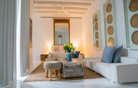 KOH SAMUI, THAILAND - JANUARY 23, 2018; luxuious bedroom interior stylishly designed and fully furnished with curtains drawn and low light effect.のeditorial素材