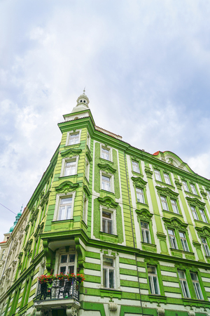 PRAGUE CZECH REPUBLIC - SEPTEMBER 1 2017; Traditional style multi story city buildings green facadeのeditorial素材