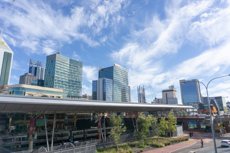 PERTH AUSTRALIA - MAY 30 2018;  Modern urban city skyline high-rise buildings tower above railway station roof in city centre.のeditorial素材