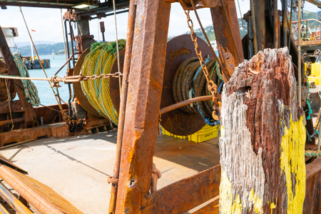 Commercial fishing boats gear and nets moored at Wharf Wellington.の写真素材