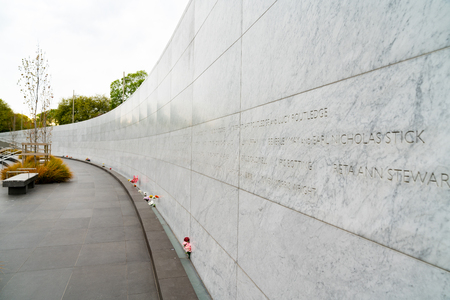 CHRISTCHURCH, NEW ZEALAND - OCTOBER 10 2018; Canterbury Earthquake Memorial Wall on side of Avon River with names of 185 lives lost engraved in white marble.のeditorial素材