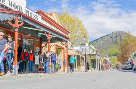 ARROWTOWN, NEW ZEALAND - OCTOBER17 2018; Tourists in street on typical day in street in popular laid-back tourist town with it's historic character buildings and peopleのeditorial素材