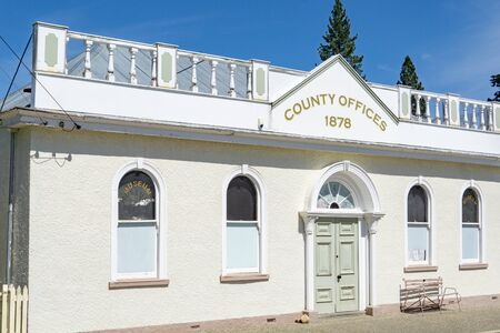 NASEBY NEW ZEALAND - OCTOBER 22 2019; Colonial architecture historic County Offices with closed doors in small Central Otago town of Naseby.のeditorial素材