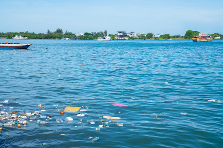 KOTA KINABALU BORNEO -JUNE 1 2019; Sea polution, plastic trash disposed of in harbor.
