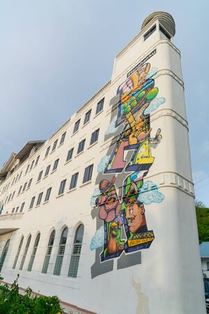 KOTA KINABALU BORNEO - MAY 31 2019; Street art on side of tall institional building by group of artists known as Cracko, Phey and Lybby in 2015のeditorial素材