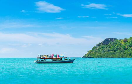 SEMPORNA BORNEO - MAY 11 2019; Sea gypsies disowned by all nations settled of the coast of Sabah live on boats in this tropical paradise.のeditorial素材