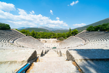 EPIDAURUS GREECE - JULY 19 2019; High up in top of Ancient Epidaurus theater looking out at...