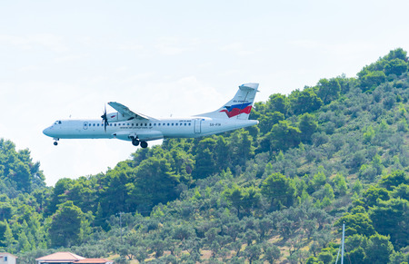 Skiathos Greece - 6 August  2019;Greek airline Skyexpress plane in flight.のeditorial素材