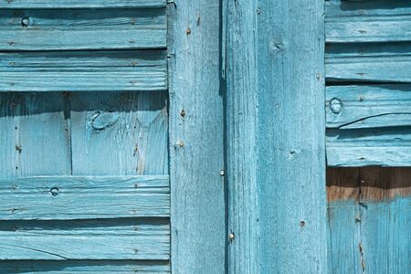 Blue wood background old damaged door panels and woodgrain.の写真素材