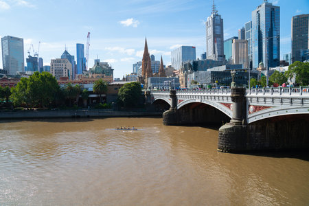 Melbourne, Australia - March 9 2020; City skyline and Yarra River view from Princes Bridge.