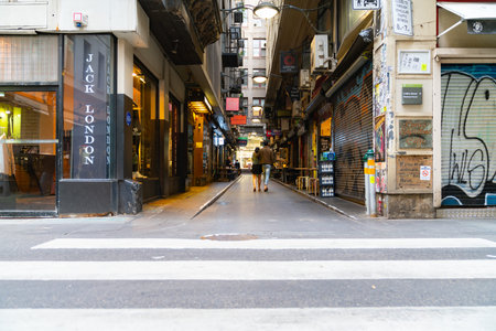 Melbourne Australia - March 14 2020; Quiet early morning movement in narrow laneway of Degraves...